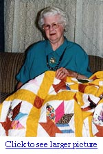 Picture of Inez Michael and the quilt